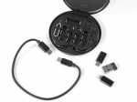 Adapter-Set in runder Box mit USB-C, Micro-USB und Lightning Anschlüssen für vielseitige Verbindungen.