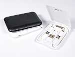 Kompakte Ladekabel-Box mit mehreren Anschlussmöglichkeiten für USB und mobile Geräte, in elegantem Schwarz und Weiß.