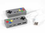USB-Hub im Controller-Design mit mehreren Anschlüssen und kreativer Gestaltung für individuellen Einsatz.